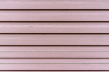Brown metal sheet of roller shutter gate textureの写真素材