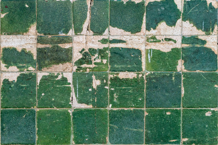 Old green ceramic tiles patternの写真素材