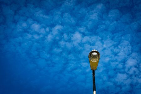Street lights on white cloud backgroundの写真素材
