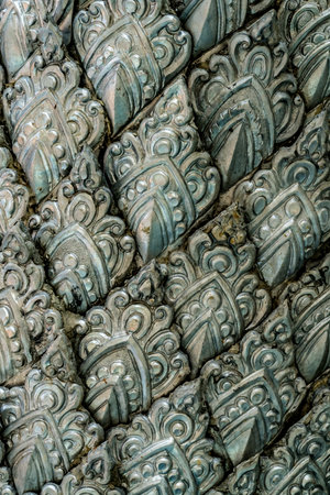 Close up image of Thai's old style pattern on silver plateの写真素材