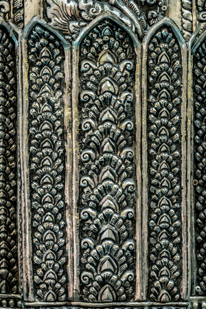 Close up image of Thai's old style pattern on silver plateの写真素材