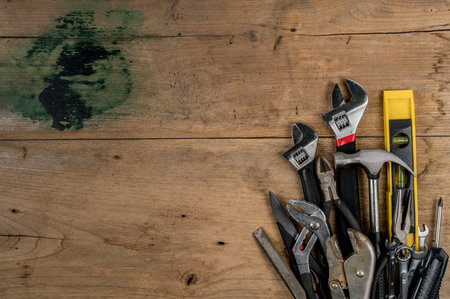 Top view of tools on wooden deskの写真素材