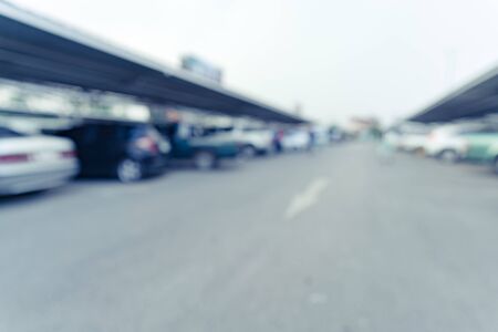 Blurred image of outdoor car parkの写真素材