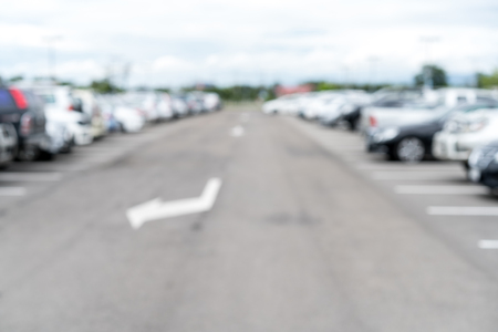 Blurred outdoor car park for background usageの写真素材