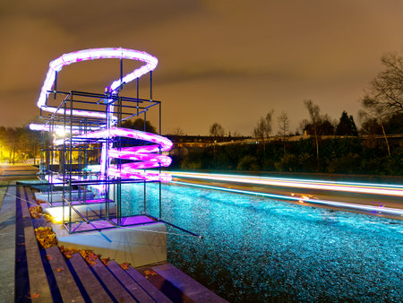 Light trails in canal during light festival night, Amsterdam, Netherlandsの写真素材