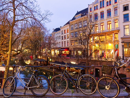 Bicycles over canal bridge, Utrecht, Netherlandsの写真素材