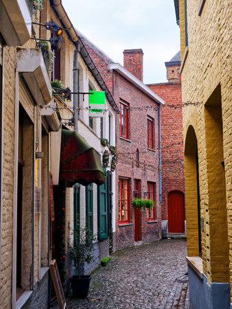 Cobbled street views of medieval city of Bruges, Belgiumの写真素材
