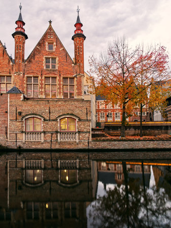 Idyllic canal building view reflection, Belgiumの写真素材