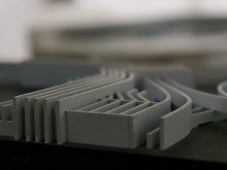 Abstract futuristic and aerodynamic architectural modelの写真素材