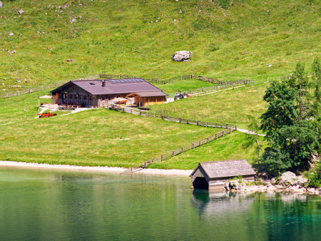 Organic farm house near lakeshore in summerの写真素材