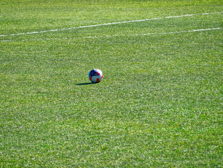 Football field background with ball in viewの写真素材