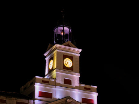 Puerta del Sol clock at night Madrid, Spainの写真素材