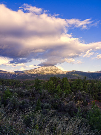 Mountain peak in sunset clouds. Dirfi mountain is located in Euboea island, Greeceの写真素材