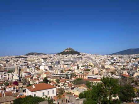 Athens city high angle view with Lycabettus hill in a sunny dayの写真素材