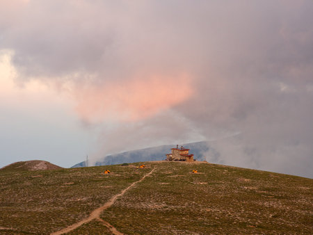 Plateau of muses with refuge and camps in view during summer evening. Olympus mountain, Greeceの写真素材