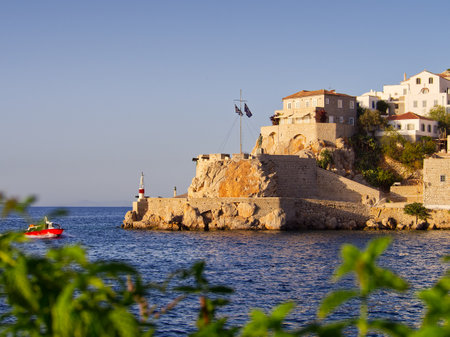 Hydra island port and sea view in sunset colors. Saronic Gulf, Greeceの写真素材