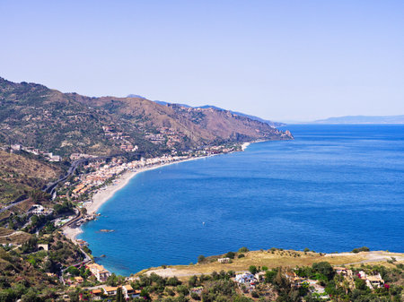 Coast of Sicily landscape as seen from Taormina on a sunny summer day.の写真素材