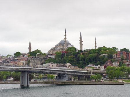 View of Suleymaniye Mosque dominating Istanbul skyline with Galata Bridge over Golden Hornの写真素材