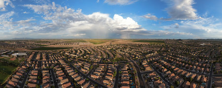 A summer Monsoon storm, approaching suburbia.の写真素材