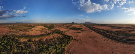 Aerial panorama of a desert landscape with a highway, Arizona, USAの写真素材