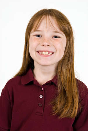 Young caucasion female in school shirtの写真素材