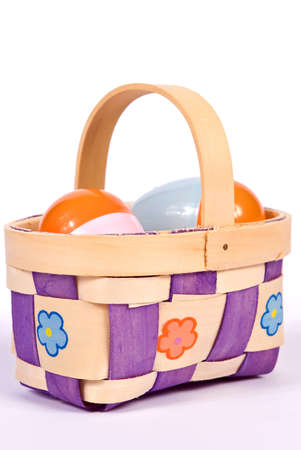 Easter basket wih colorful eggsの写真素材
