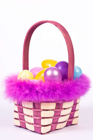 Easter basket wih colorful eggsの写真素材