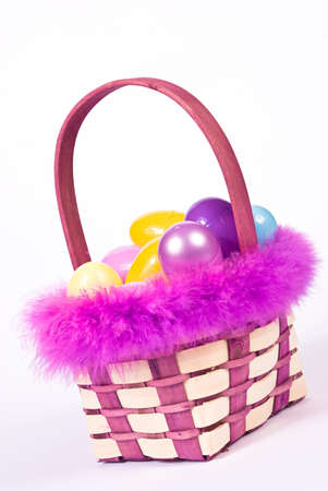 Easter basket wih colorful eggsの写真素材