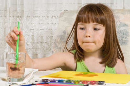Young girl paintingの写真素材