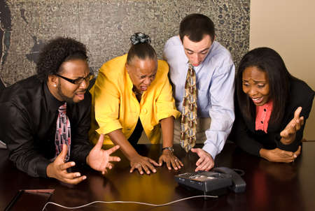 Angry work group on a conference callの写真素材