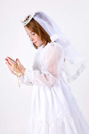 Young girl's First Communion  Reading a Bibleの写真素材