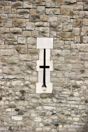 Brick wall with small window, Tower of London, UKの写真素材