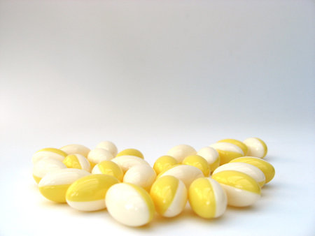 white & yellow pillsの写真素材