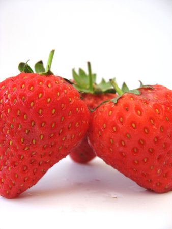 three strawberrys on a white backgroundの写真素材