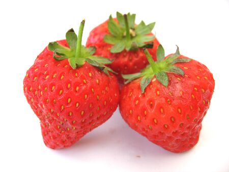 three strawberrys on a white backgroundの写真素材