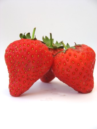 three strawberrys on a white backgroundの写真素材