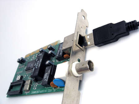 cable going into board on white backgroundの写真素材