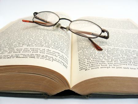 a photo of a book and glassesの写真素材