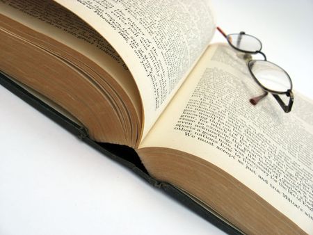 photo of a book and glassesの写真素材