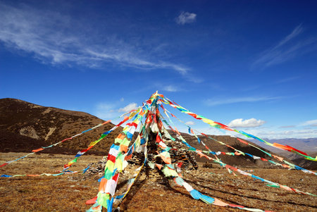 Prayer flags at the mountain topの写真素材