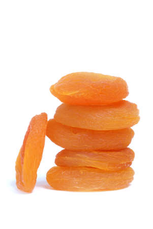 Close up of dried apricots. Isolated on white.の写真素材