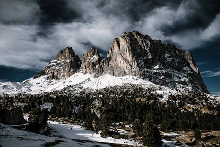 A mountain range a the Gardena Pass in the Dolomites, North Italy in winter.の写真素材
