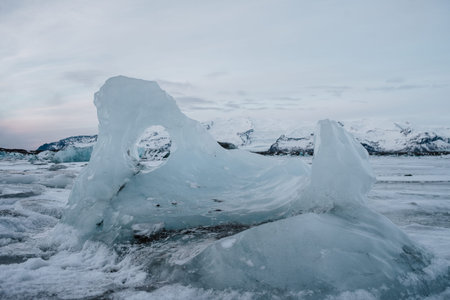 Some Icebergs with a hole in them in glacier lagoon in Iceland