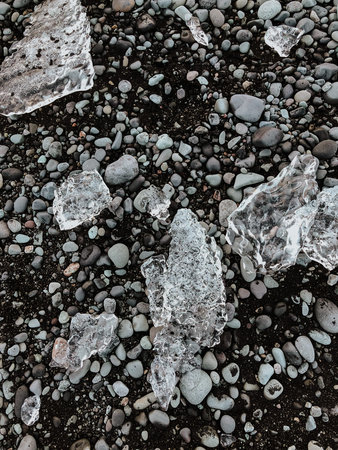 Ground structure with some ice crystals in Diamond Beach, Iceland