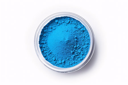 A vivid azure matte eyeshadow is displayed on a milky backdrop.の素材