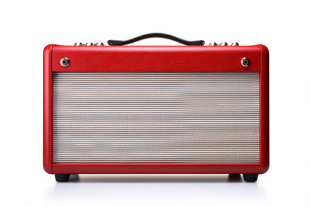 A retro-inspired, wireless loudspeaker is on a white backdrop, evoking a guitar amplifier.の素材