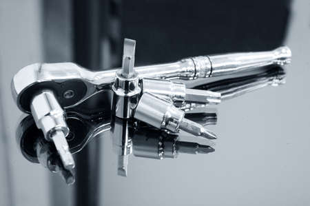 tools on a glassの写真素材