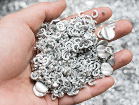 Scrap metal aluminum in handの写真素材