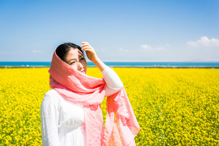 Asian women in rape flower