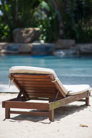 Outdoor lounge chair by a swimming pool